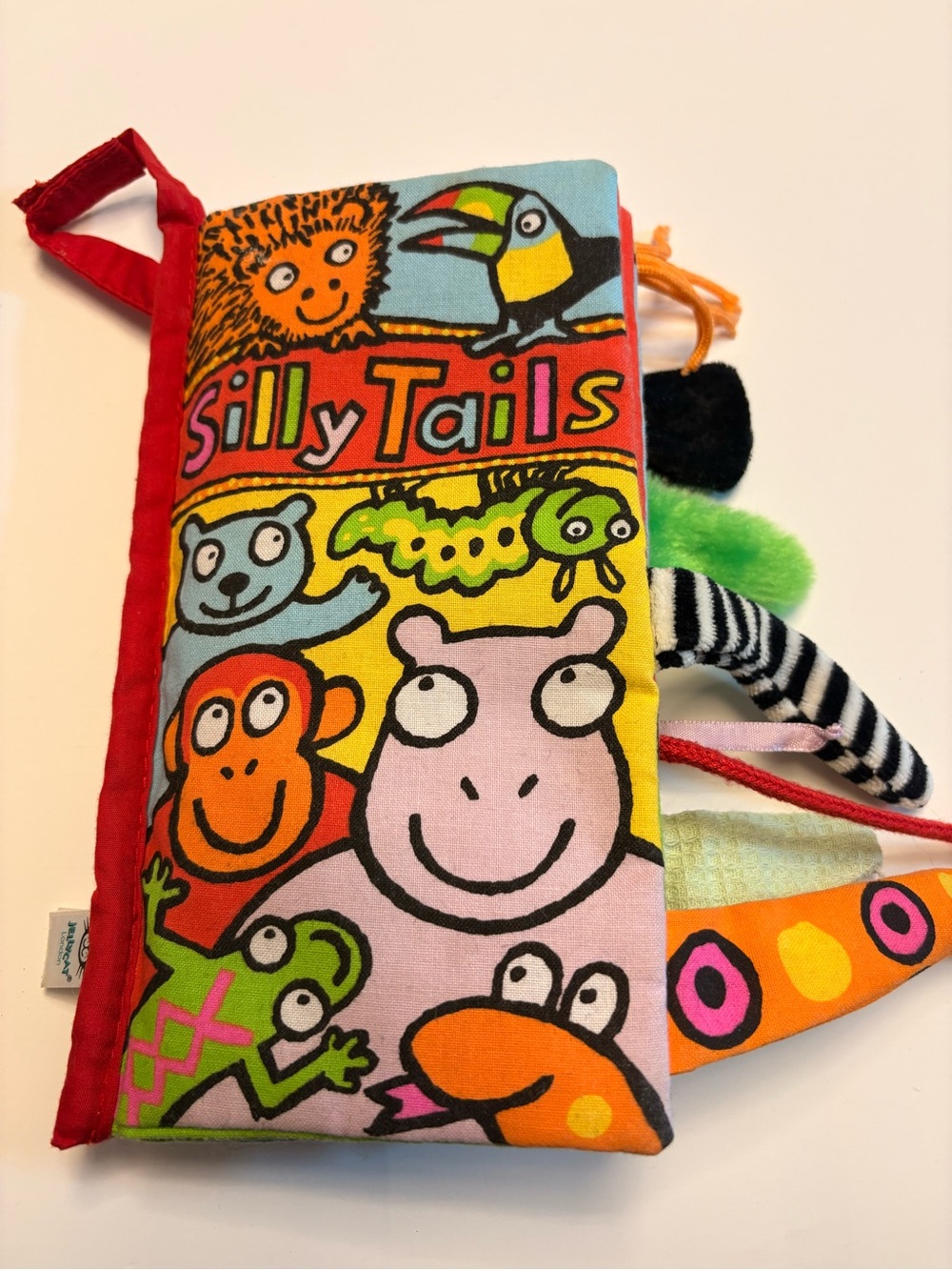 Jellycat Silly Tails Colourful Soft Crinkle Activity book